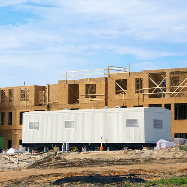 construction site office trailers require a flat, level surface for installation and may need utility hookups for power and water